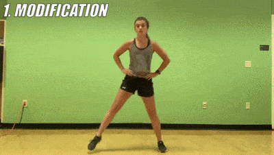 female demonstrating modified lateral to curtsy lunge