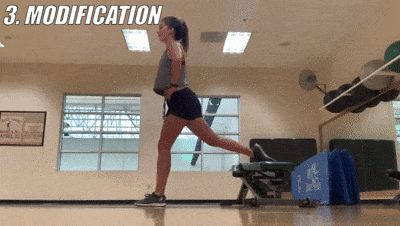 female demonstrating modified ​​split squat hop
