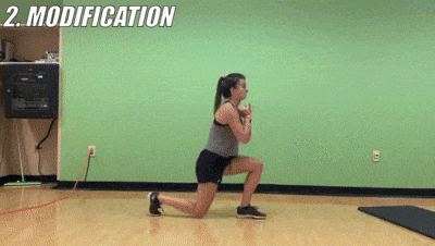 female demonstrating modified reverse lunge + knee drive