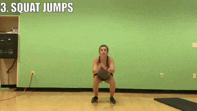 female demonstrating squat jumps