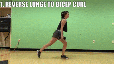 female demonstrating reverse lunge to bicep curl