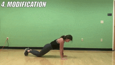 woman demonstrating modified 3-1 tricep push ups