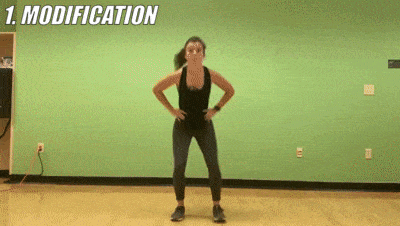 woman demonstrating modified squat rotations