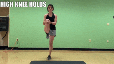 woman demonstrating high knee holds