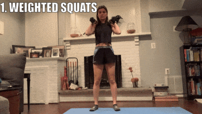 woman demonstrating weighted squats