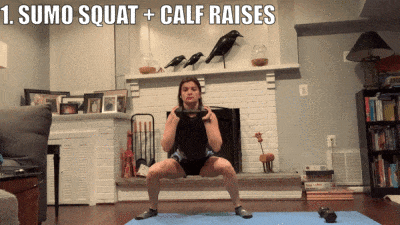 woman demonstrating sumo squat + calf raises