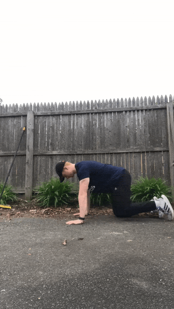 man demonstrating fire hydrant exercise