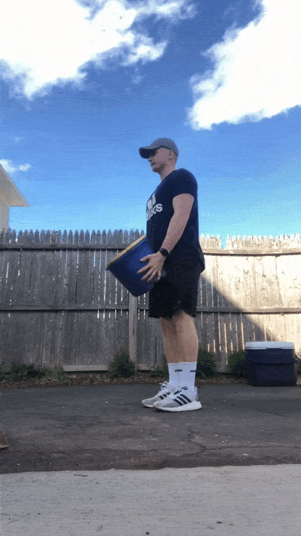 man demonstrating modified lateral raise