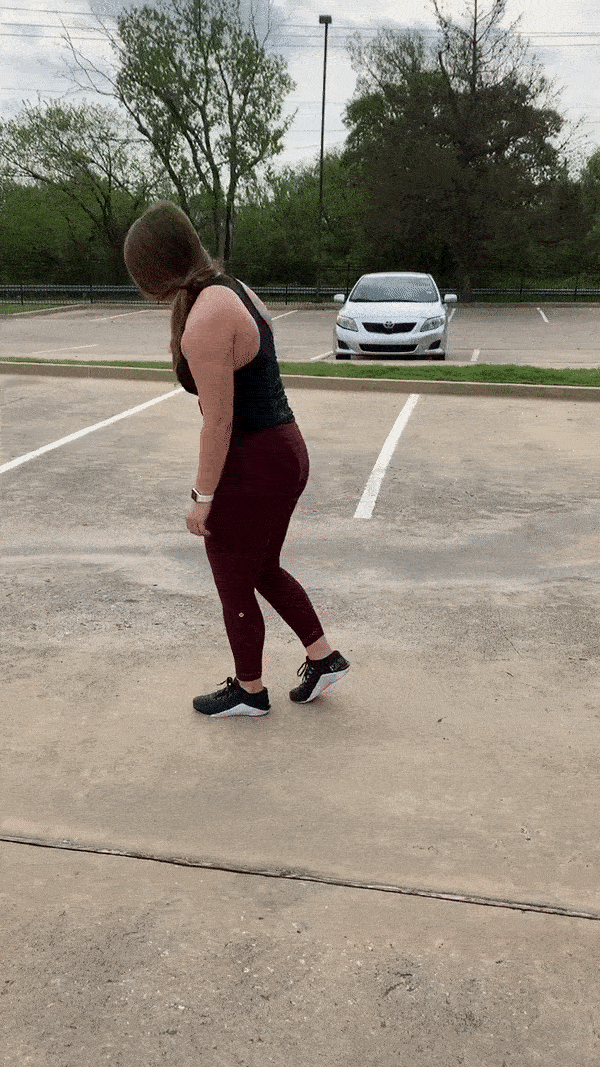 female demonstrating modified reverse lunge