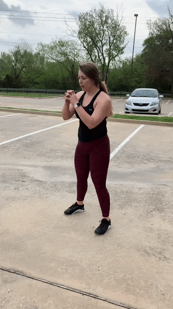 female demonstrating modified squat jump