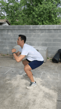 man demonstrating jump squats