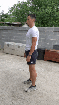man demonstrating jab cross high knees modification