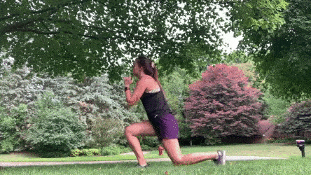woman demonstrating reverse lunge jump right