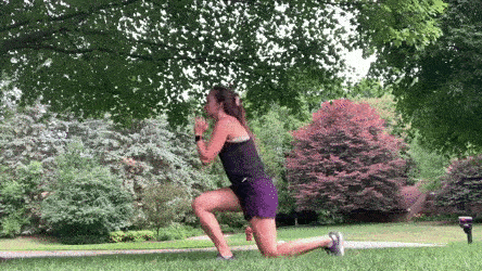 woman demonstrating reverse lunge jump right modification