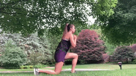 woman demonstrating reverse lunge jump left
