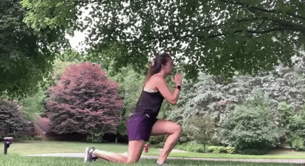 woman demonstrating reverse lunge jump left modification
