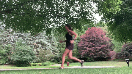 woman demonstrating forward sprint backward jog burpee