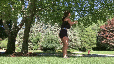 female demonstrating squat jumps modification