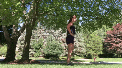 female demonstrating lunge jump modification