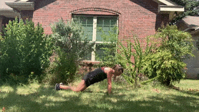 female demonstrating modified plank hold