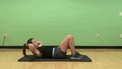 female demonstrating 3 crunches 3 reverse crunches