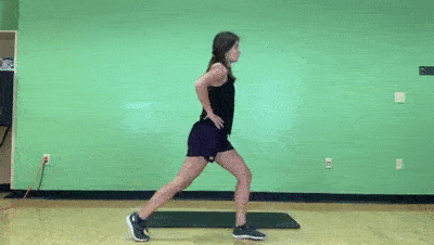 female demonstrating modified lunge to airplane