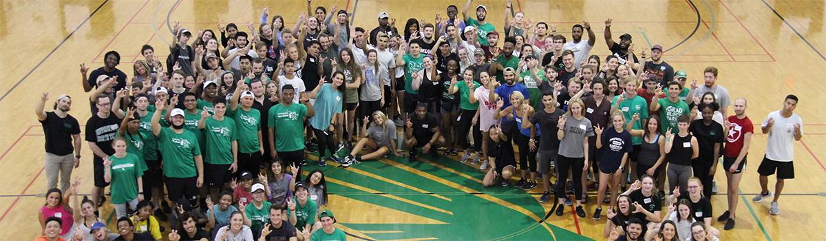 rec student staff together on basketball court